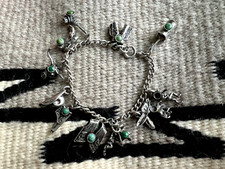 Vtg SOUTHWESTERN FRED HARVEY ERA 11-CHARM BRACELET ster. snake eye turquoise 7