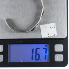 6.35