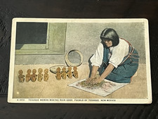 1940s FRED HARVEY POSTCARD WOMAN MAKING RAIN GODS, PUEBLO OF TESUQUE NM