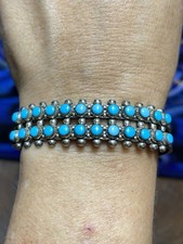 Vintage sterling, silver turquoise snake eye Fred Harvey era Double Row cuff.