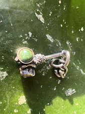 Vintage snake eye turquoise STERLING SILVER TOMAHAWK CHARM .925 Fred Harvey era